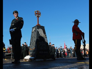 The honour guard stands at the cenotaph during the Remembrance Day wreath laying ceremony at the Military Museums in Calgary on  Saturday November 11, 2017.