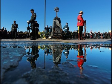 The honour guard stands at the cenotaph during the Remembrance Day wreath laying ceremony at the Military Museums in Calgary on  Saturday November 11, 2017.