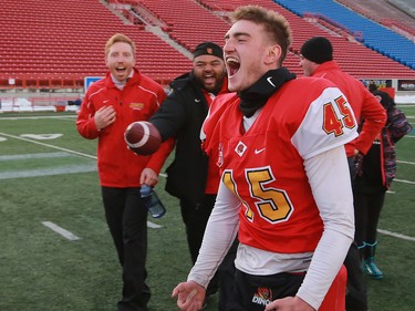 U of C Dinos kicker Niko Difonte celebrates after his 59 yard field goal in the final seconds cinched the game over the UBC Thunderbirds 44-43.