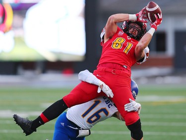The U of C Dinos Tyler Ledwos catches a pass in the second half of the Hardy Cup on Saturday November 11, 2017. The Dinos won over the UBC Thunderbirds after Niko Difonte kicked a game-winning 59-Yard goal in the closing seconds to win the game 44-43.