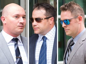 Kevin Humfrey, James Othen and Mike Sandalack exit the Calgary Courts Centre on Aug. 21, 2017. The CPS officers are charged with assaulting Clayton Prince.