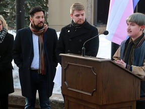 Transgender student Levin Ifko speaks before helping to raise the Transgender Pride flag at McDougall Centre in Calgary to recognize Transgender Day of Remembrance on Monday November 20, 2017. Listening are from left; MLA Sandra Jansen, Ricardo Miranda, Minister of Culture and Tourism and MLA Michael Connolly. Gavin Young/Postmedia