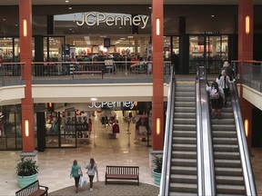 Shoppers head to a J.C. Penney store in the Georgia Square Mall in Athens, Ga.