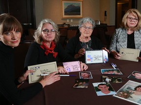 From left; Rosalind Davis, Petra Schulz, Leslie McBain and Donna May have all lost loved ones to the opioid crisis. On Tuesday they were joining hundreds of families across Canada sending photos of their loved ones with messages to the Prime Minister. The four gathered at an opioid conference as part of national addiction awareness week at the Hyatt Regency Hotel in Calgary. Gavin Young/Postmedia