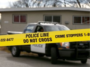 Calgary police investigate a scene in Dover on Saturday.