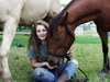 Valerie Dangremond with Reiner and Misty. “One of the biggest things that made me want to move to Canada was the chance to have horses,” she says.