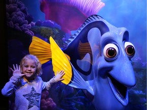 Posing with Dory in the Pixar exhibition. Photo courtesy Curt Woodhall