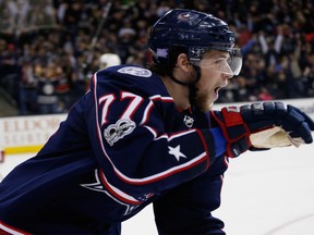 the Columbus Blue Jackets' Josh Anderson celebrates his goal against the Calgary Flames during the overtime period of an NHL hockey game Wednesday, Nov. 22, 2017, in Columbus, Ohio. The Blue Jackets beat the Flames 1-0 in overtime.