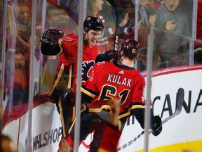 Calgary Flames Mark Jankowski celebrates with teammate Brett Kulak after scoring against the St. Louis Blues during NHL hockey at the Scotiabank Saddledome in Calgary on Monday, November 13, 2017. Al Charest/Postmedia