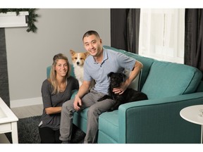 Jason and Amanda Siu and their dogs Coco and Tucker at their new home by Shane Homes in Midtown.