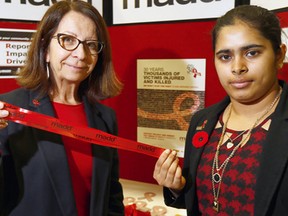L-R, Brenda Lavaliee, MADD Calgary and Japnoor Kharbanda, victim of drunk driving who lost her father, were on hand as MADD Calgary (Mothers Against Drunk Driving) kicked off their 30th Anniversary annual launch of the Project Red Ribbon Campaign to promote sober driving during the holiday season on Thursday November 2, 2017. Darren Makowichuk/Postmedia
