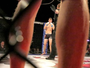 Nolan Shergold gets set to fight Ji Haugen in the first bout at the School of Hard Knocks Championship at the Century Casino in 2014. Mike Drew/Postmedia Network