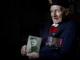 Rusty Ogle, 99, veteran of the Second World War, poses for a portrait at the Colonel Belcher veterans home in Calgary on Wednesday November 8, 2017. Leah Hennel/Postmedia