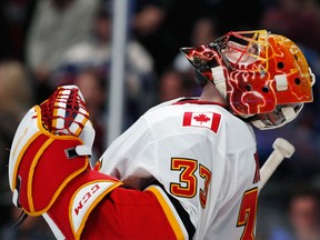 Calgary Flames goalie David Rittich reacts as time runs out in the team's NHL hockey game against the Colorado Avalanche on Saturday, Nov. 25, 2017, in Denver. The Flames won 3-2.