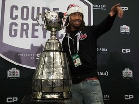 Calgary Stampeders defensive back Shaquille Richardson poses with the Grey Cup during Media Day on Nov. 23, 2017