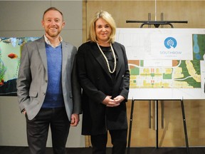 PBA Land has received approval to develop South Bow Crossing in Cochrane. Pictured are James Scott, vice-president planning, and chief executive Patricia Phillips.