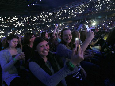 Students cheer on the fun during WE Day Alberta at the Scotiabank Saddledome on Wednesday November 1, 2017. Darren Makowichuk/Postmedia