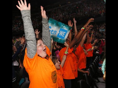 Students cheer on the fun during WE Day Alberta at the Scotiabank Saddledome on Wednesday November 1, 2017. Darren Makowichuk/Postmedia