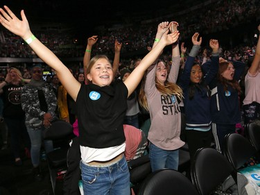 Students cheer on the fun during WE Day Alberta at the Scotiabank Saddledome on Wednesday November 1, 2017. Darren Makowichuk/Postmedia