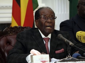 Zimbabwean President Robert Mugabe delivers his speech during a live broadcast at State House in Harare, Sunday, Nov, 19, 2017.