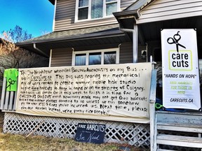 A note hung by Misty Wind Shingoose on the front of her Calgary home, on Nov. 24 2017. Facebook photo
