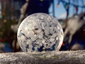 It's cold enough outside to make ice bubbles. Calgary photographer Chris Ratzlaff spent part of Boxing Day outside, freezing and photographing bubbles. A bubble in the process of freezing is seen in this Dec. 26, 2017, handout image. THE CANADIAN PRESS/HO-Chris Ratzlaff, *MANDATORY CREDIT*