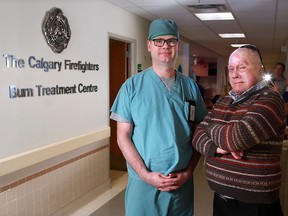 Dr. Duncan Nickerson, medical director of the Calgary Burn Treatment Centre, and burn survivor Don Adamson at Foothills Hospital on Dec. 7, 2017.