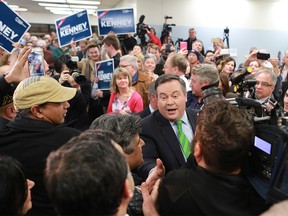 Jason Kenney works his way through supporters at his campaign headquarters after  after winning the Calgary Lougheed by-election on Thursday December 14, 2017. Gavin Young/Postmedia