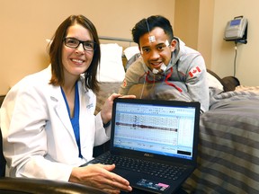 Amy Bender, Clinical Program Director Athletic Services for Centre For Sleep and Human Performance with client Olympic speedskater Gilmore Junio as Bender developed a first-of-its-kind online tool that accurately identifies sleep disturbances in elite athletes and recommends effective treatment plans, ultimately improving their athletic performance in Calgary on Tuesday December 12, 2017. Darren Makowichuk/Postmedia