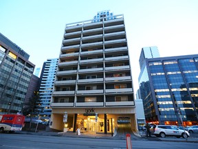 Police say a trio of teens and an adult are all facing charges for allegedly confining a woman against her will in an apartment in downtown Calgary, where she was repeatedly sexually assaulted for nearly a week before she was able to escape. Al Charest/Postmedia