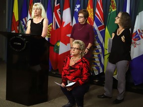 Members of the Thalidomide Survivors Task Group hold a news conference on Parliament Hill. From left to right are Fiona Sampson, Mary Ryder, Lee Ann Dalling and Alexandra Niblock.