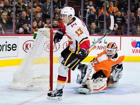 Flames' Johnny Gaudreau scores on Philadelphia Flyers' Brian Elliott on Saturday, Nov. 18, 2017, in Philadelphia.