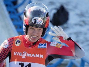 Calgary's Alex Gough, celebrates her second place finish in the women's World Cup luge competition in Calgary on Dec. 9, 2017.