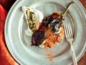 A spin on chile relleno – roasted, stuffed and battered fresh poblano peppers – this Hanukkah dish incorporates Mexican techniques and flavours.