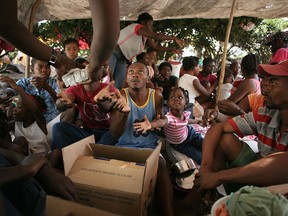 Food supplies are handed out by the UN World Food Program in Port-au-Prince on Jan. 18, 2010, as part of relief efforts after the Haiti earthquake.