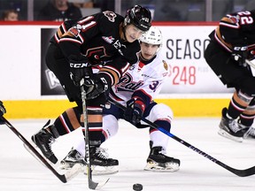 The Calgary Hitmen can't find the room they need to score a victory Sunday over the Regina Pats at the Saddledome.