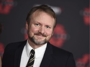 Director Rian Johnson arrives at the Los Angeles premiere of Star Wars: The Last Jedi at the Shrine Auditorium.