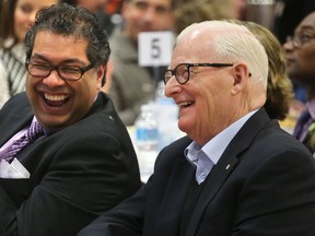 Calgary must have both the intellectual and fiscal tools to compete with other cities that have dedicated the resources necessary to be a serious player in attracting investment, says Jim Gray, seen with Mayor Naheed Nenshi.