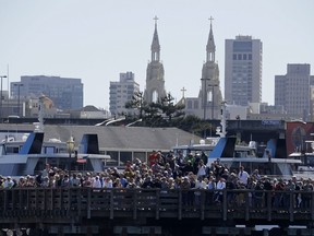 In this Sept. 18, 2013, file photo, crowds gather at Pier 39.