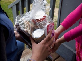 Sutton Garner and her mom Bobbi Turko started I Can For Kids Foundation to deliver food packs to youth during the lean summer months when there's no school support. Courtesy, TS Lane