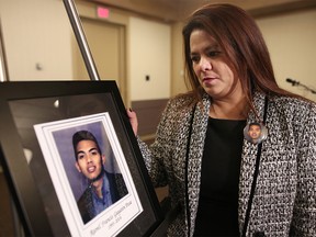 Grace Pesa speaks to the media at the Westin hotel in Calgary, Ab., on Tuesday January 9, 2018, about the her son Francis Pesa who was killed by an impaired driver four years ago i Leah Hennel/Postmedia