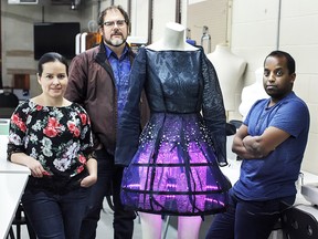 Part of the team behind StitchKit, a fashion tech starter kit aimed at those who want to try creating wearable technology, is pictured in their Calgary studio on Monday, Jan. 22, 2018. The kit includes a custom Arduino board and LED lights, and was created as a collaboration between MakeFashion and WearLabs. Pictured from left is MakeFashion co-founders Maria Elena Hoover and Shannon Hoover (middle) and Wear Labs co-founder Teddy Seyed. Kerianne Sproule/Postmedia