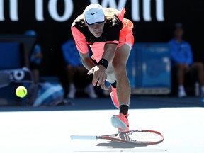 Denis Shapovalov unsuccessfully chases down a ball against Jo-Wilfried Tsonga at the Australian Open on Jan, 17.