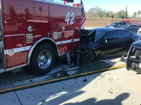 A Tesla rear ends a parked firetruck in Culver City