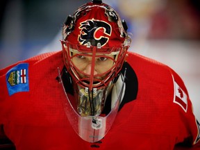 Flames Hockey Calgary Flames goaltender Mike Smith during the pre-game skate before facing the St. Louis Blues in NHL hockey at the Scotiabank Saddledome in Calgary on Monday, November 13, 2017. Al Charest/Postmedia Postmedia Calgary AL Charest, Al Charest/Postmedia