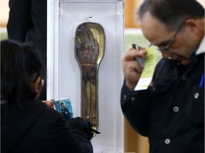 Thousands came out to see the right forearm of St. Francis Xavier as it made its first-ever stop in Calgary at St. Albert the Great Parish on Sunday  giving Calgarians the chance to see the relic amid its 14-city tour across Canada on Sunday January 21, 2018. Darren Makowichuk/Postmedia