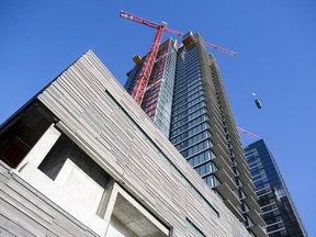 Vancouver-based Axiom Builders Inc. recently topped the 36-storey apartment block that forms part of the two-tower project at 10th Avenue and 5th Street S.W. Photo courtesy Spindrift Productions