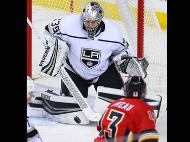 Los Angeles Kings goaltender Darcy Kuemper takes this Calgary Flames shot on the pads during NHL action in Calgary on Wednesday January 24, 2018.