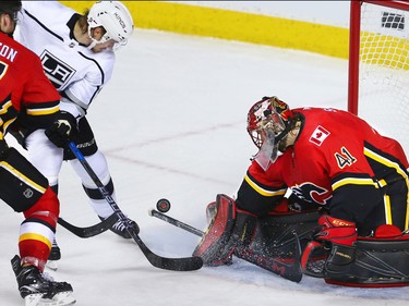 Calgary Flames goaltender Mike Smith stops this Los Angeles Kings attack during NHL action in Calgary on Wednesday January 24, 2018.