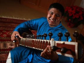 Ayush Ghosh is the youngest professional sitar player in the world and one of this year's 20 Compelling Calgarians. He was photographed at home on Thursday December 14, 2017. Gavin Young/Postmedia

Postmedia Calgary